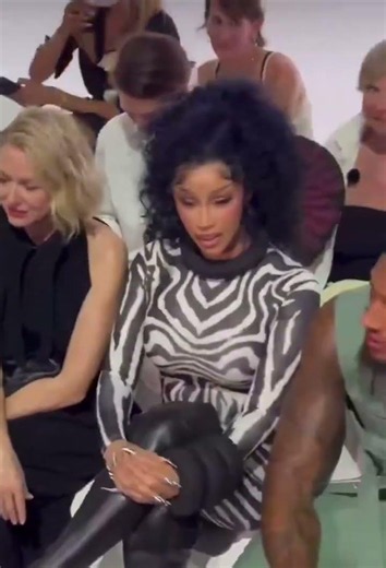 Cardi B front row alongside Maduka Okoye at Jean Paul Gaultier’s fashion show in Paris.🖤