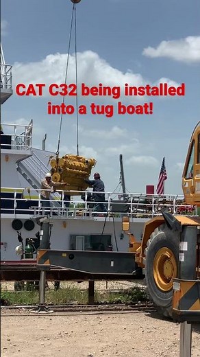 CAT C32 1000hp Engine being installed into a tug boat.