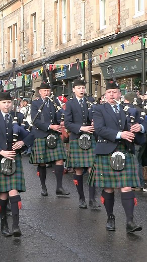 The Vale of Atholl Pipe Band led by Pipe Major Kyle Howie march in to start the 2024 Pitlochry New Year Street Party. The band march out of Fishers Hotel Pitlochry onto Atholl Road and then form a playing circle for their displays. Here they were playing Wings into Rowan Tree. #pitlochry #perthshire #perthshirescotland #scotland #newyearsday2024 #streetparty #valeofatholl #bagpipes #pipesanddrums #pipebandlife | Scotland's Pipe Bands