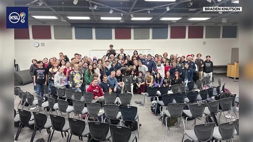 Musician surprises Herriman High School marching band while on tour