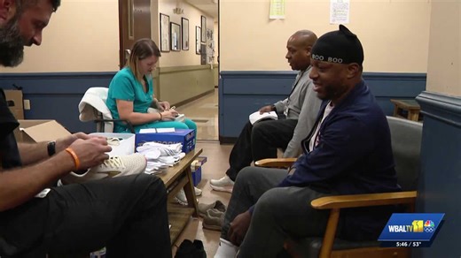 Mercy Medical Center teams give out shoes, socks, exams