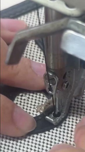 the sewing process of joining leather to fabric using a sewing machine#sewing