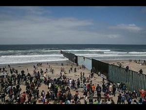 Mexican Migrants Illegally Crossing the Tijuana border into the US