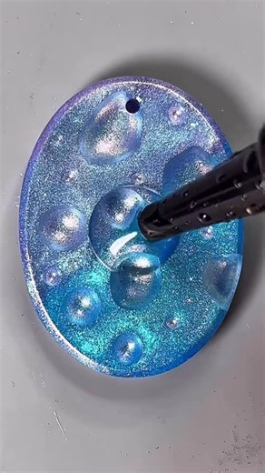 Pearl Drop Studio on Instagram: "A “water droplet” 💧 in uv resin pendant. Features chameleon mica powder with pearlescent UV resins. Supplies I use linked in my bio. ⭐️ #reels #satisfying #resinart #fyp #handmade"