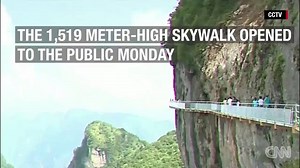 31K views · 524 reactions | Don't look down! A cliff-clinging glass skywalk just opened to the public in southern China. Would you walk on it? | HLN | Facebook