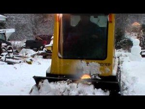 Bombardier SW 48 plowing snow