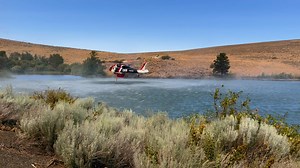26K views · 374 reactions | WATCH: Helicopter scoops water from French Canyon Reservoir to fight Retreat Fire, July 25. U.S. Highway 12 is closed from the White Pass summit to the Y junction. For more updates, visit: https://yhne.ws/3YjzE0J | Yakima Herald-Republic | Facebook