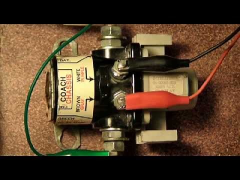 What is a latching relay in an RV battery?