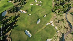 Golf course with bunkers and green grass. Lush tropical landscape in Saint Lucia, Caribbean