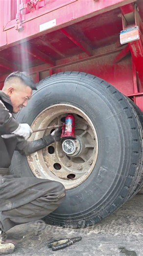 WATCH Genius Mechanic Trick Pop A Frozen Axle Cap Effortlessly 🦾