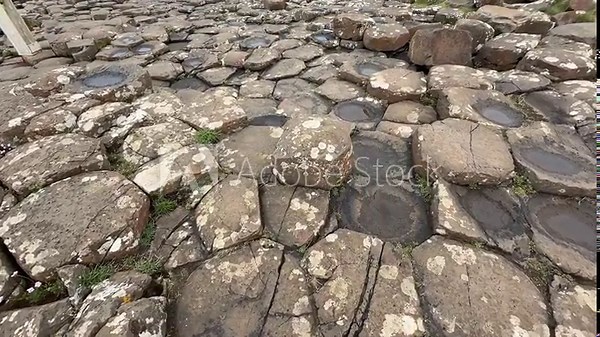 The Giant's Causeway, a UNESCO World Heritage Site on Northern Ireland's Antrim Coast, features 40,000 interlocking basalt columns formed by volcanic activity. Its hexagonal stones and coastal beauty