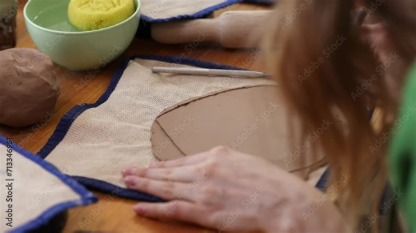 Master class on creating ceramic products. Cutting shapes with a fettling knife