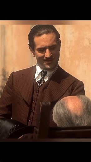 Ntertainmint on Instagram: "The Godfather Part II (1974) The Godfather Part II tells two parallel stories that slowly mirror and contrast each other. One follows Michael Corleone, now the cold, calculating head of the Corleone family, as he expands the empire through power, fear, and betrayal—losing his soul in the process. The other traces the rise of young Vito Corleone, from a poor Sicilian immigrant to a respected crime boss, showing how family loyalty and necessity shaped his path. Together