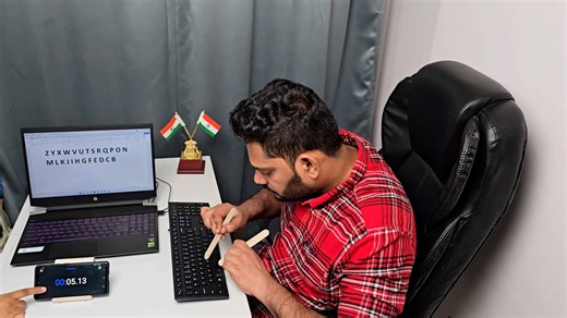 Typing alphabet backwards with ice lolly sticks record