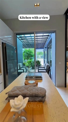 Eco Forest by EcoWorld on Instagram: "POV: You’re in the kitchen, but the view feels like a quiet garden escape. 🌿 Sunlight filters in, greenery slows the pace, and suddenly, the kitchen feels like the best seat in the house. Everyday living, softly surrounded by green. 📍 EcoWorld Gallery @ EcoForest 📲 Contact us today. Intan: 018-211 2126 Danial: 012-228 9261 Kathryn: 016-661 2552 Louis: 012-292 3952 Michelle: 012-202 6305 Wen Han: 012-338 5236 Hanafi: 012-233 8792 #EcoWorld #EcoForest #Seme