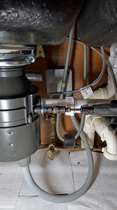 Repiping a kitchen sink drain 💦 Replacing this garbage disposal and incorrect tubular drain piping from below this kitchen sink #diy #asmr #fyp #reels #homerepair #plumbingrepair #foryou #plomero #handyman | The Plumberlorian