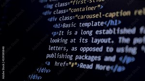 4K Close-up shot HTML tag code on PC Monitor scroll down. Background concept for programming and coding web development.