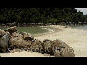 Timelapse of tombolo as tide changes, Malaysia. 67053.uhd