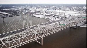 Drone view of Abraham Lincoln Bridge (Toll) and Big Four Bridge crossing Ohio River in Louisville