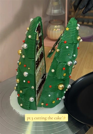 Cutting into the Christmas Tree Cake