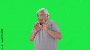 Scared Indian old man afraid of someone Green screen