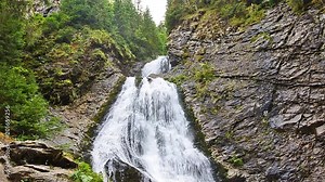 Bride's Veil waterfall in the Carpathian mountains in the Transylvania region of Romania with a beautiful fresh pure clean calm look
