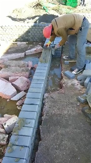 Building the perfect path, one brick at a time! 🧱🚶‍♂️ #ConstructionJourney #DIYProgress | Charline Signe