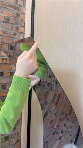 This acrylic full-length mirror#features a self-adhesive design, requiring no tools to easily#mirror