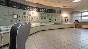 Control room industrial panel button switch dial monitoring safety engineering power console control board indicators monitors empty chair