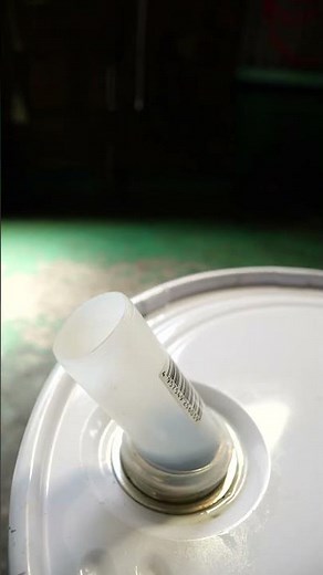 Plastic opening prevents oil from spilling from pails