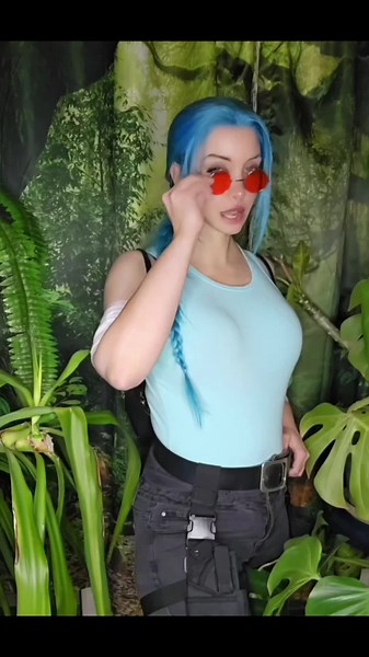 Lara Croft Hot: Cosplay Trends with Blue Hair and Red Glasses