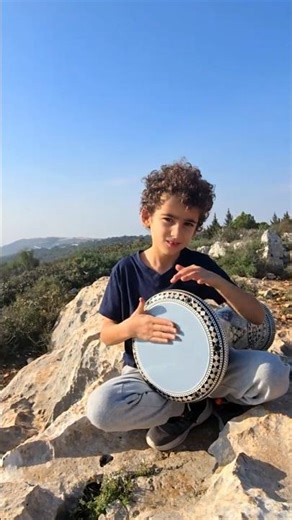 Epic Darbuka Solo Echoing Across a Majestic Mountain View