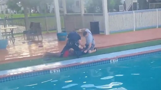 Ex-Galveston cop indicted on 8 charges including injury to a child and assault after poolside brawl, DA's office says