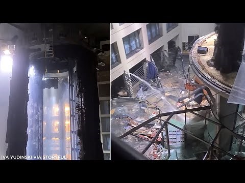 World's largest cylindrical aquarium explodes