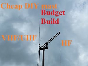 Ham radio mast Part 2 Antenna mast from parking lot light pole and custom bracket