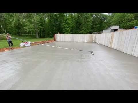 Smoothing Concrete with a Float.