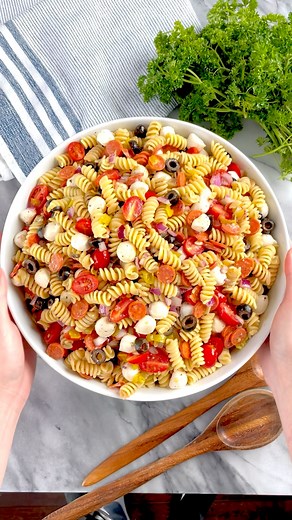 This classic Italian pasta salad recipe is so simple to put together! Light and fresh, it’s the perfect addition to a picnic or potluck. https://thestayathomechef.com/italian-pasta-salad/ | The Stay At Home Chef