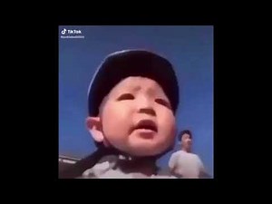 asian kid falling off bike but pvz