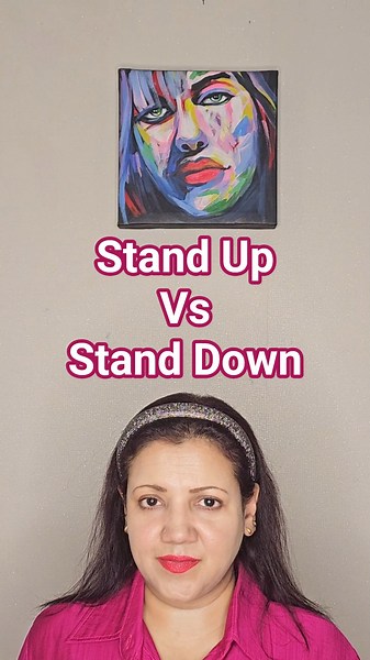 Stand Up For vs Stand Down - Essential English Phrasal Verbs Explained with Examples