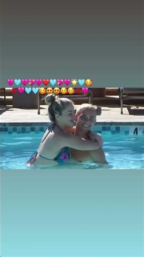 Baby Ariel in a pool and European hills