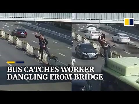Bus catches worker dangling from bridge in China
