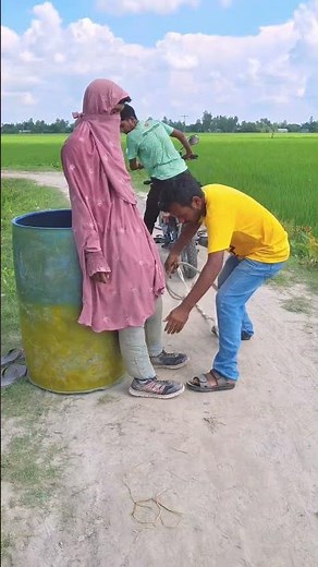 The woman tied a rope to her leg and pulled it.