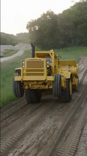 Operating a Classic CAT 660 Scraper — Doing Wheelies
