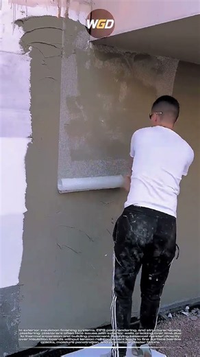 Exterior wall reinforcement technique: Fiberglass mesh embedding in basecoat plaster for crack-free