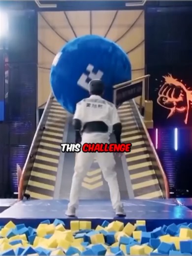 Physics Challenge: Woman Stops Giant Rolling Ball with Technique