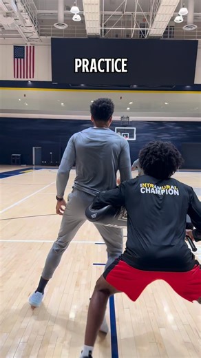 We intentionally put players in environments that are harder than the game. Smaller targets. Against Blockers. Less time to organize. These clips are a simple example, shooting on a reduced rim with blockers forcing real decision-making in the exact areas he’ll receive the ball in a game. It’s about exposing the system to stress so adaptation actually happens. DM CODE if you want to understand how we structure environments that transfer to real performance. #bbcode #basketballbiomechanics | Bask