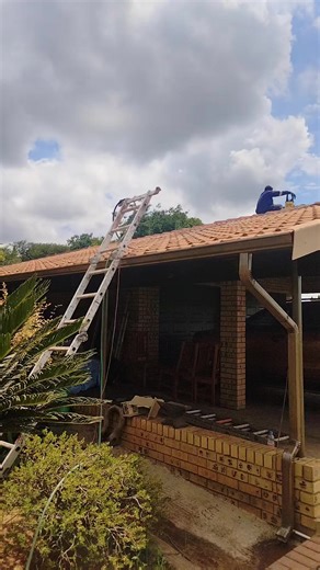 Transforming Roofs and Gutters with Airless Spray Painting