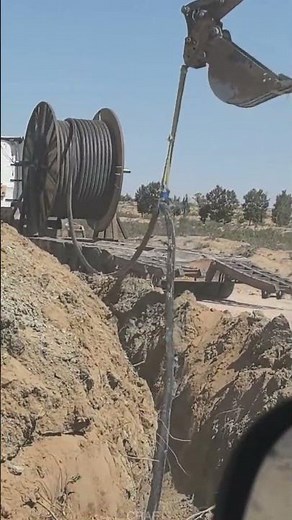 Technique of Coordinated Cable Embedding by Excavator and Truck