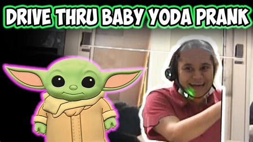 Baby Yoda appears to drive a car through the drive-thru