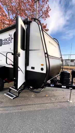 The 2023 Winnebago Hike 100 is one of the most unique used units to come across our lot in a while! It features a lot of sleeping space for the size and great versatility. You can lounge with friends with the opposing jack knife sofas. Then the drop down queen size bed makes for a comfortable nights sleep! | Camping World | Facebook